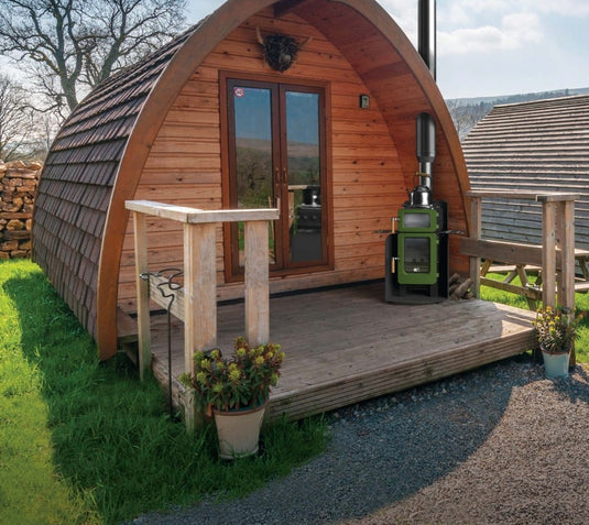 Ekol Baked Apple Pie Wood Burning Ecodesign Stove installed in a glamping hut