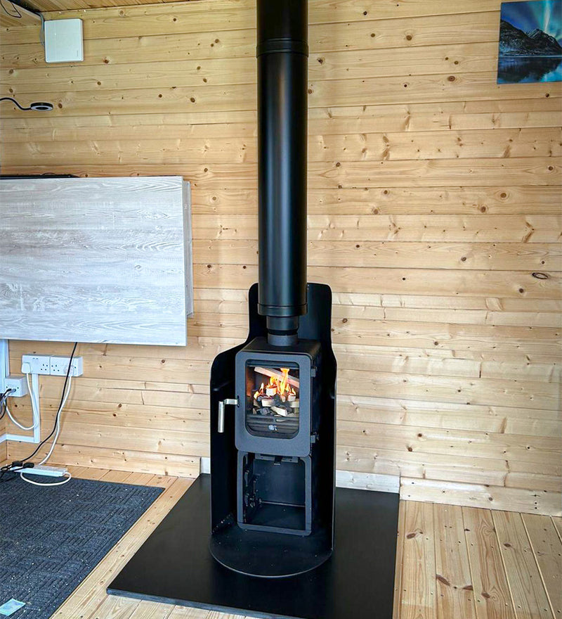 Load image into Gallery viewer, Ekol Apple Pie Stack Wood Burning Ecodesign Stove installed in an office
